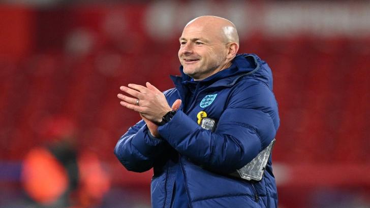 England interim manager Lee Carsley claps the crowd after a game